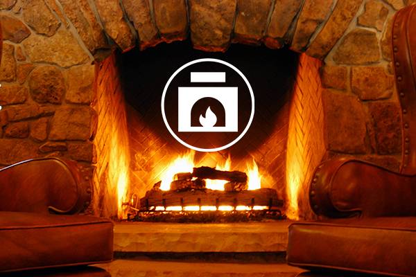 Fireplace in Lobby of Suites at Silver Tree Suites At Silver Tree Hotel Amenities